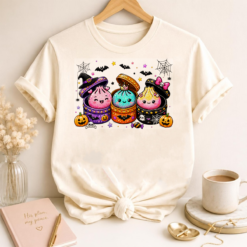 White t-shirt mockup featuring the Halloween Dumplings PNG design with cute kawaii dumplings, pumpkins, bats, and spider webs.